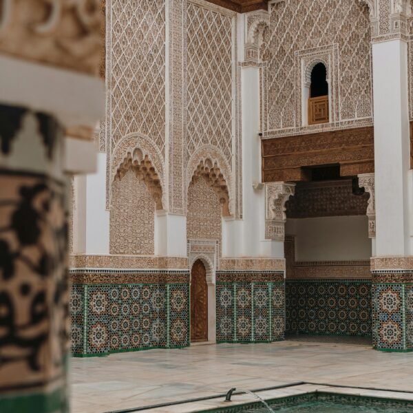 Beautifully detailed architectural facade in Marrakesh, showcasing traditional Moroccan designs.