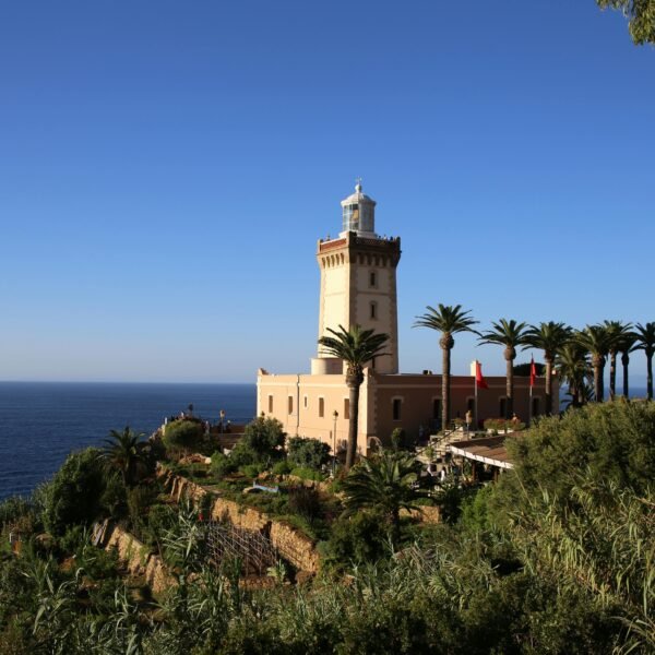 Stunning view of the Cape Spartel Lighthouse in Tangier, Morocco by the sea.