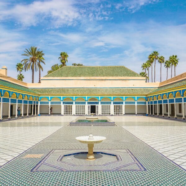 Explore the beautiful courtyard of Bahia Palace in Marrakesh, Morocco, with elegant architecture.